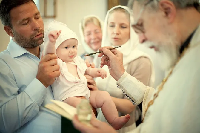 Крестный отец на крещении
