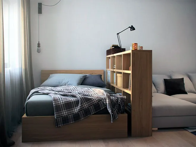Кровать разделена с диваном функциональным стеллажом